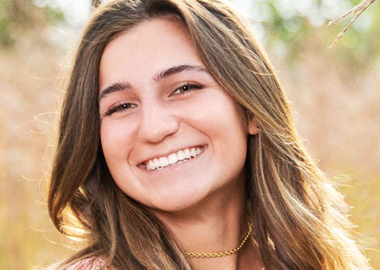 smiling teenager with a dazzling smile